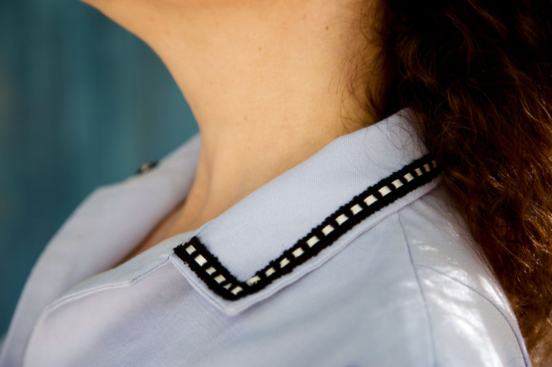 ribbon-insert trim on collar
